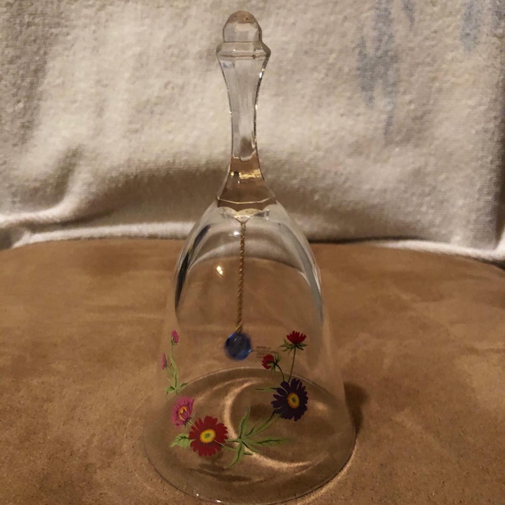 Glass bell with flowers